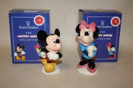 A PAIR OF BOXED ROYAL DOULTON MICKEY MOUSE COLLECTION FIGURES OF MICKEY AND MINNIE MOUSE WITH GOLD