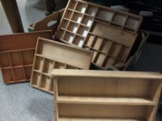A TRAY OF WOODEN DISPLAY STANDS