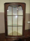 AN ANTIQUE WALNUT GLAZED HANGING CORNER CABINET H-100 CM