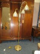 A MODERN THREE LIGHT LAMP STANDARD
