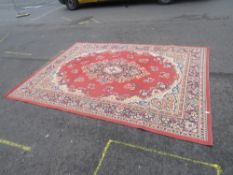A LARGE MODERN PATTERNED RUG