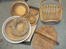 A COLLECTION OF ASSORTED WICKER BASKETS