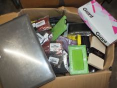 A CAGE OF MIXED ITEMS TO INCLUDE MOSTLY PHONE CASES, WRISTBANDS ETC ( CAGE NOT INCLUDED )