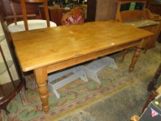A LARGE PINE FARMHOUSE STYLE KITCHEN TABLE H-78 L-183 CM