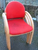 A LARGE QUANTITY OF RED UPHOLSTERED STACKING CHAIRS A/F (APPROX 40 )