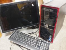 A HP PAVILION ELITE HPE SERIES COMPUTER WITH MONITOR AND KEYBOARD
