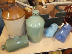 THREE STONEWARE HOT WATER BOTTLES TOGETHER WITH TWO STONEWARE FLAGONS