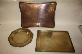 THREE ORIENTAL COPPER AND BRASS TRAYS