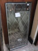 A PAIR OF LEADED WINDOWS 91 CM X 48 CM TOGETHER WITH A SMALLER LEADED WINDOW 83 CM X 43 CM