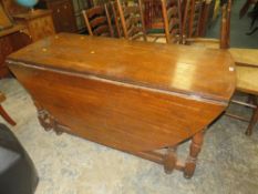 A LARGE AND HEAVY OAK DROPLEAF GATELEG TABLE H-76 DIA-184 CM