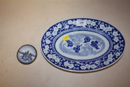 AN ORIENTAL BLUE AND WHITE OVAL DISH TOGETHER WITH A SILVER HANDPAINTED BLUE AND WHITE MINIATURE