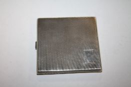 A HALLMARKED SILVER CIGARETTE CASE