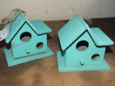 A BOX OF BIRD HOUSES