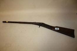 A FAIR GROUND STYLE SPRING LOADED GUN