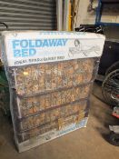 A RETRO FOLD AWAY BED IN ORIGINAL PACKAGING