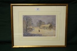 A FRAMED AND GLAZED WATERCOLOUR OF A FIGURE IN A COUNTRY LANDSCAPE WITH COTTAGES BY ROBERT MANN