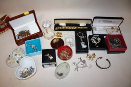 A BOX OF COSTUME JEWELLERY