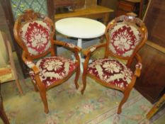 A PAIR OF MODERN CARVED ARMCHAIRS AND A WHITE PEDESTAL TABLE (3)