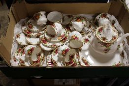 A TRAY OF ROYAL ALBERT OLD COUNTRY ROSES, TO INCLUDE TEA POT, TRIOS ETC.