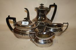 A FOUR PIECE SILVER PLATED TEA SET