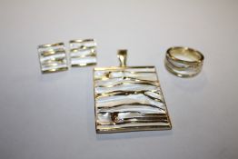 A SILVER GILT RING, PENDANT AND EARRING SET, APPROX WEIGHT 21.4 G