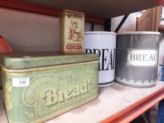 THREE METAL BREAD BINS PLUS ANOTHER TIN