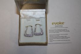 A PAIR OF EVOKE GOLD 'N' ICE 9 CARAT GOLD AND SWAROVSKI EARRINGS