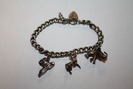 A VINTAGE SILVER CHARM BRACELET, APPROX WEIGHT 24.5 G