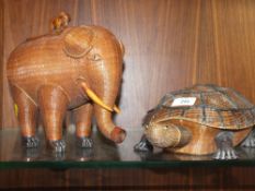 TWO ORIENTAL HAND WOVEN LIDDED BOXES, IN THE FORM OF A TORTOISE AND AN ELEPHANT
