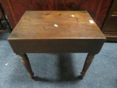 AN ANTIQUE MAHOGANY COMMODE STOOL