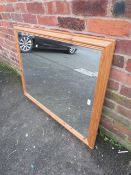 A LARGE MODERN PINE FRAMED MIRROR 114 X 88 CM