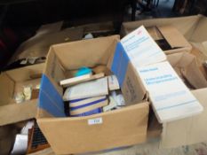 A QUANTITY OF MICROCHIPS, PEG BOARDS, AND A RADIOSHACK INSTRUCTION BOOK (5 BOXES)