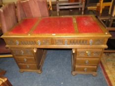 AN 'OLD CHARM' STYLE CARVED OAK LEATHER TOPPED TWIN PEDESTAL DESK H-79 W-138 CM