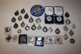 A QUANTITY OF CYCLING RELATED FOB MEDALS AWARDED TO G. GOULDING AND G. TILDESLEY TO INCLUDE 18