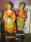 A PAIR OF 1920'S STYLE DUTCH TYPE CHALK FIGURES