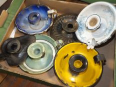 A SMALL TRAY OF ENAMELLED CHAMBER STICKS