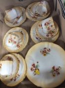 A TRAY OF NAUTILUS FLORAL PORCELAIN CHINA