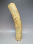 A LATE 19TH / EARLY 20TH CENTURY BENIN IVORY TUSK VASE, decorated with typical tribal figures and