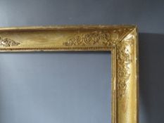 AN 18TH CENTURY FRENCH DECORATIVE GOLD FRAME WITH INTEGRAL SLIP, frame W 8 cm, frame rebate 66 x