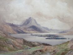 FINLAY MACKINNON (1870-1931). Extensive stormy mountainous lake scene, signed lower right,