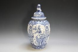 AN OCTAGONAL BLUE AND WHITE TEMPLE JAR AND COVER, decorated with birds and insects, H 43.5