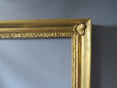 AN 18TH CENTURY GOLD FRAME WITH SHELL EMBELLISHMENTS TO INNER CORNERS, frame W 7 cm, frame rebate