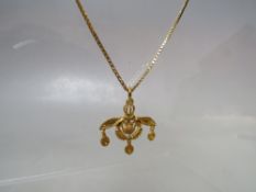 A 14CT GOLD BUG PENDANT ON 9CT GOLD CHAIN, approx. combined weight 4.1 g