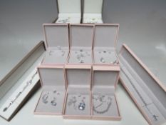 A COLLECTION OF MAINLY QVC DIAMONIQUE SILVER AND CUBIC ZIRCONIA JEWELLERY ITEMS, comprising three