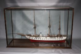 A LARGE GLASS CASED WOODEN MODEL OF THE ADMIRAL JYLLAND, overall dimensions W 115.5 cm, D 39.5 cm, H