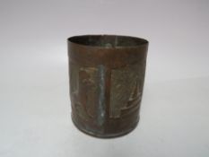 AN UNUSUAL FOLK / TRENCH ART CANISTER WITH RELIEF DECORATION, of cylindrical form embellished with