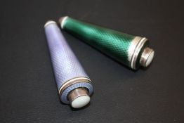 TWO GUILLOCHE ENAMEL BELL PULLS, one in lilac, the other in olive green A/F, both with a sprung