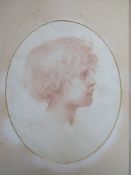 EARLY PRE-RAPHAELITE STYLE, oval head study of a young child, signed with monogram middle to lower