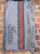A LADIES TONAL GREY GUCCI SCARF, fringe detail to ends L 124 cm, W 68 cmCondition Report:Some