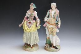 A PAIR OF MEISSEN FIGURES OF A YOUNG LADY AND A YOUNG MAN BOTH HOLDING A BASKET AND A POSY OF
